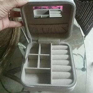 Brand new 5×5 inch zip up Jewelry box.